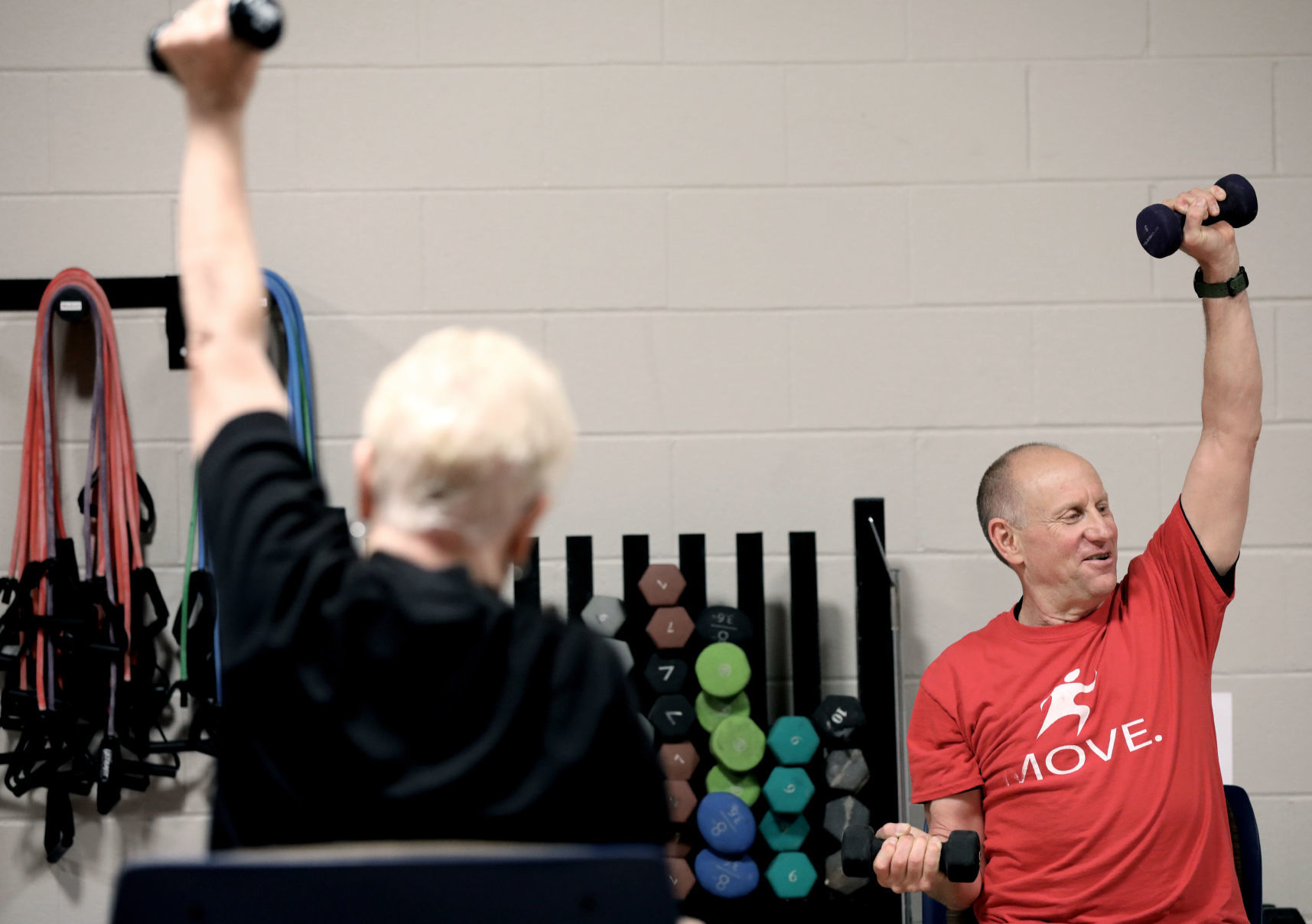 Ron and others lifting weights